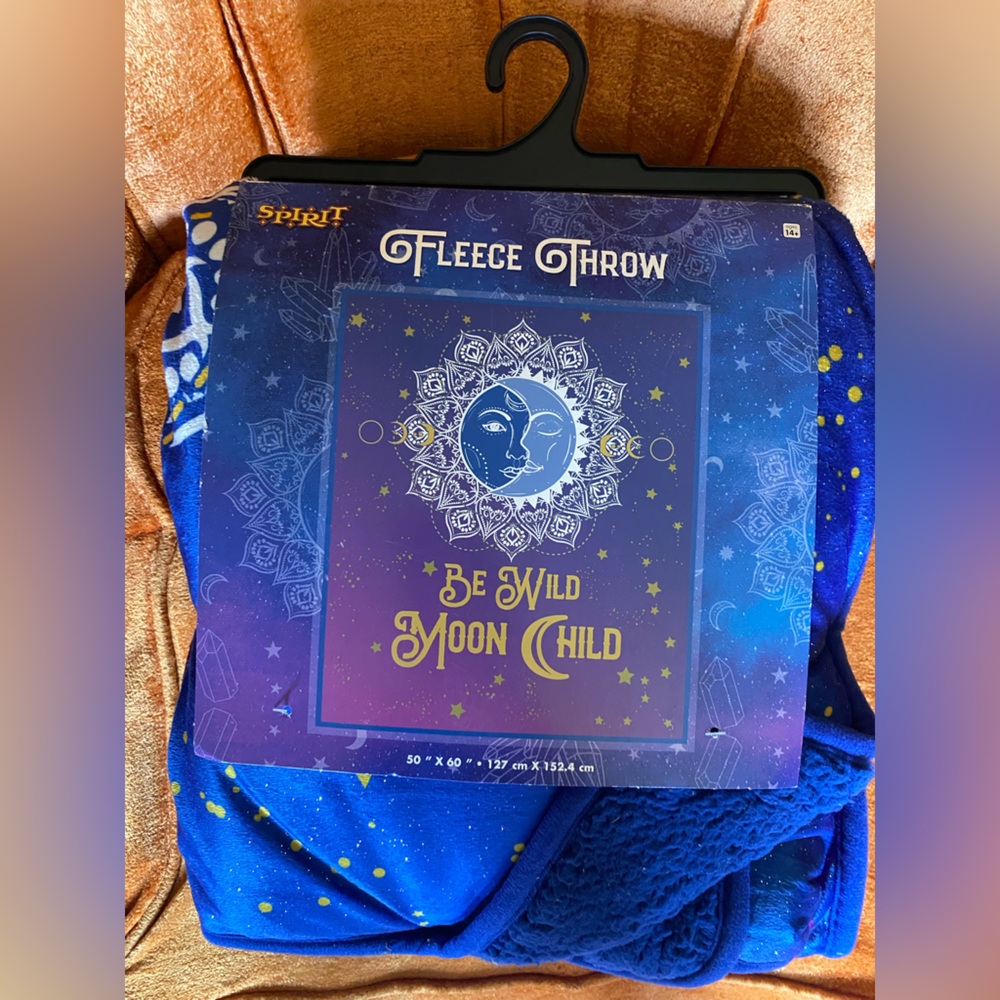 Spirit Halloween “Be Wild Moon Child” fleece throw blanket